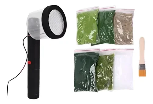 Aplicação de grama em pó sobre maquete com cola branca